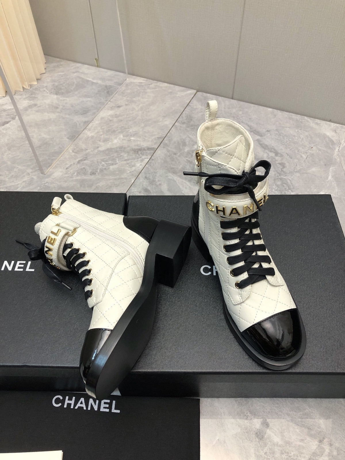 CC Short Boots 45mm In White Mix Black Quilted Lambskin And Glossy Cowhide 950036