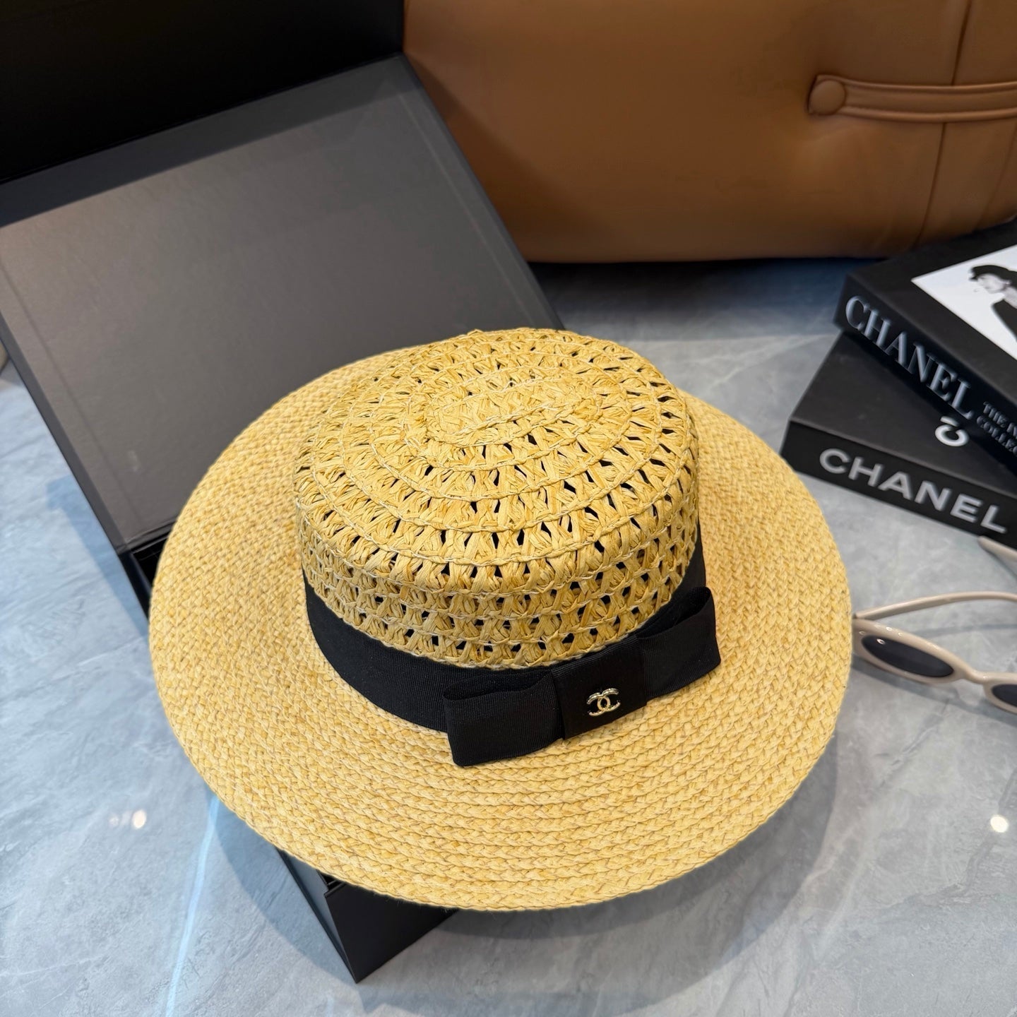 Chanel Straw Hat With Black Ribbon Accent 250043