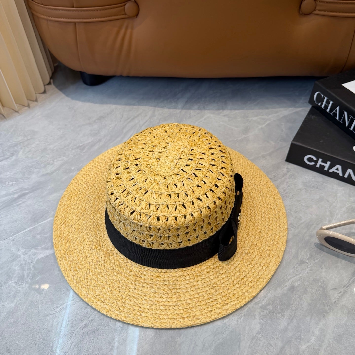 Chanel Straw Hat With Black Ribbon Accent 250043