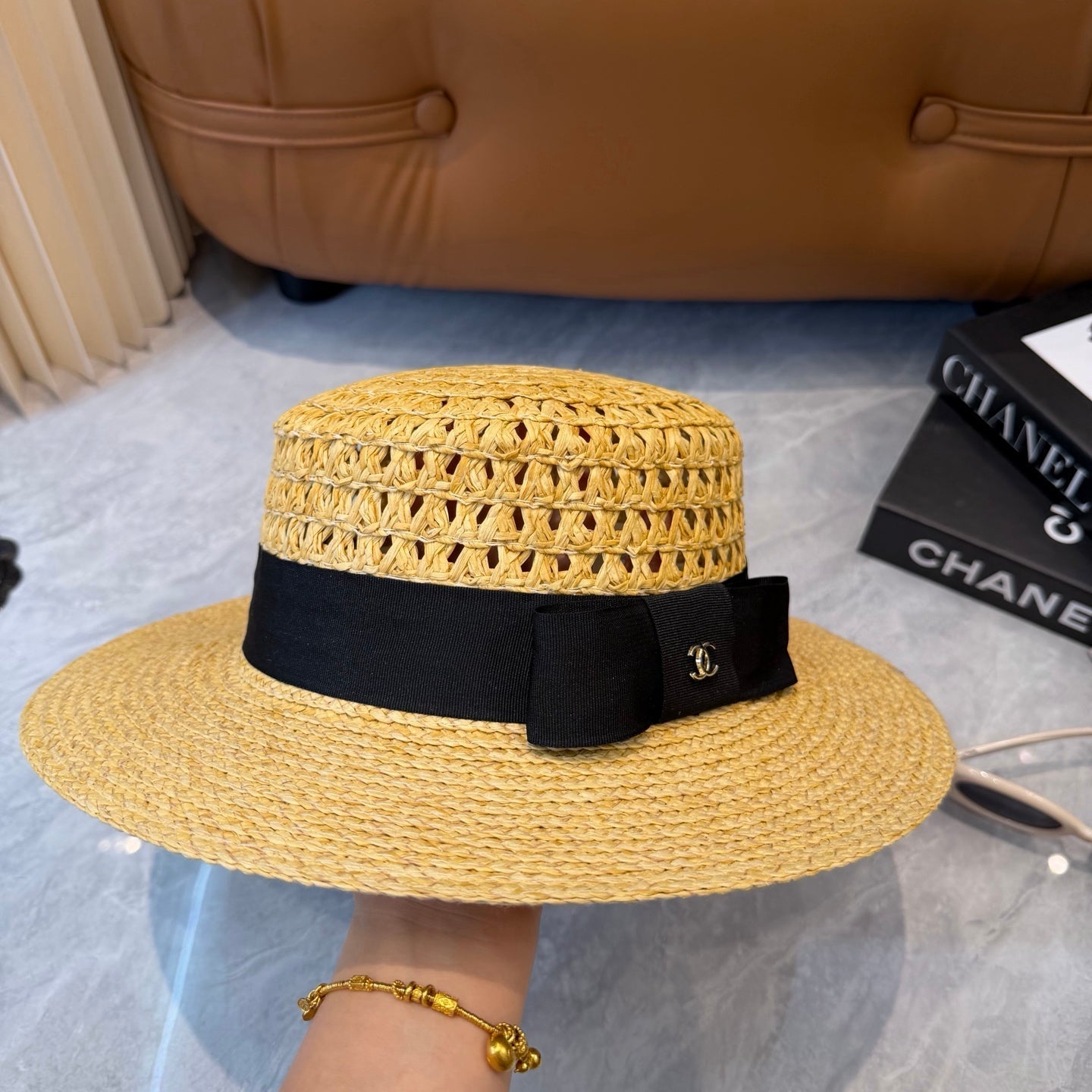 Chanel Straw Hat With Black Ribbon Accent 250043