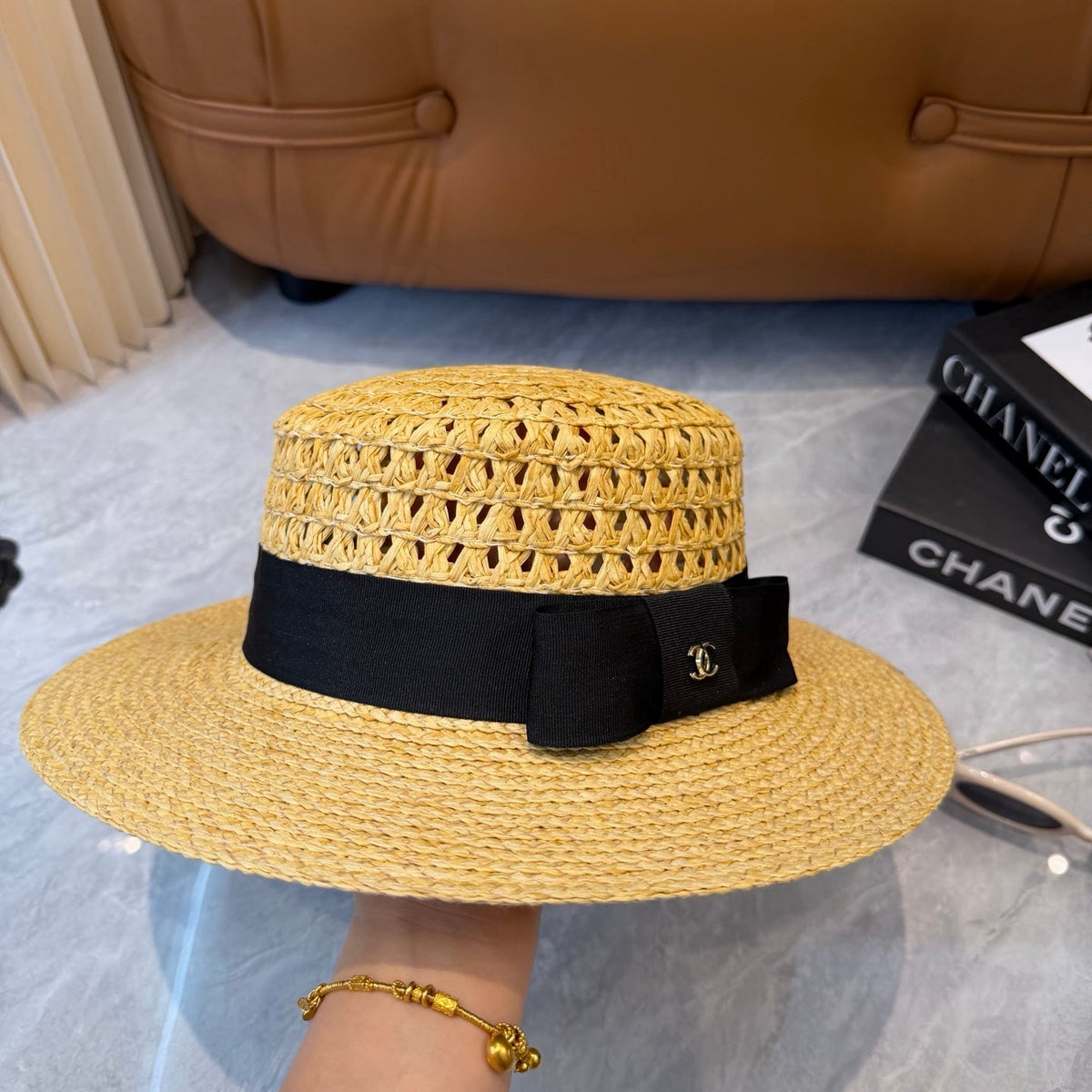 Chanel Straw Hat With Black Ribbon Accent 250043