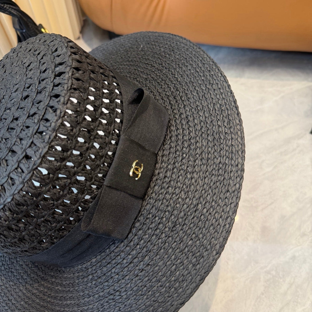 Chanel Straw Hat With Black Ribbon Accent 250043