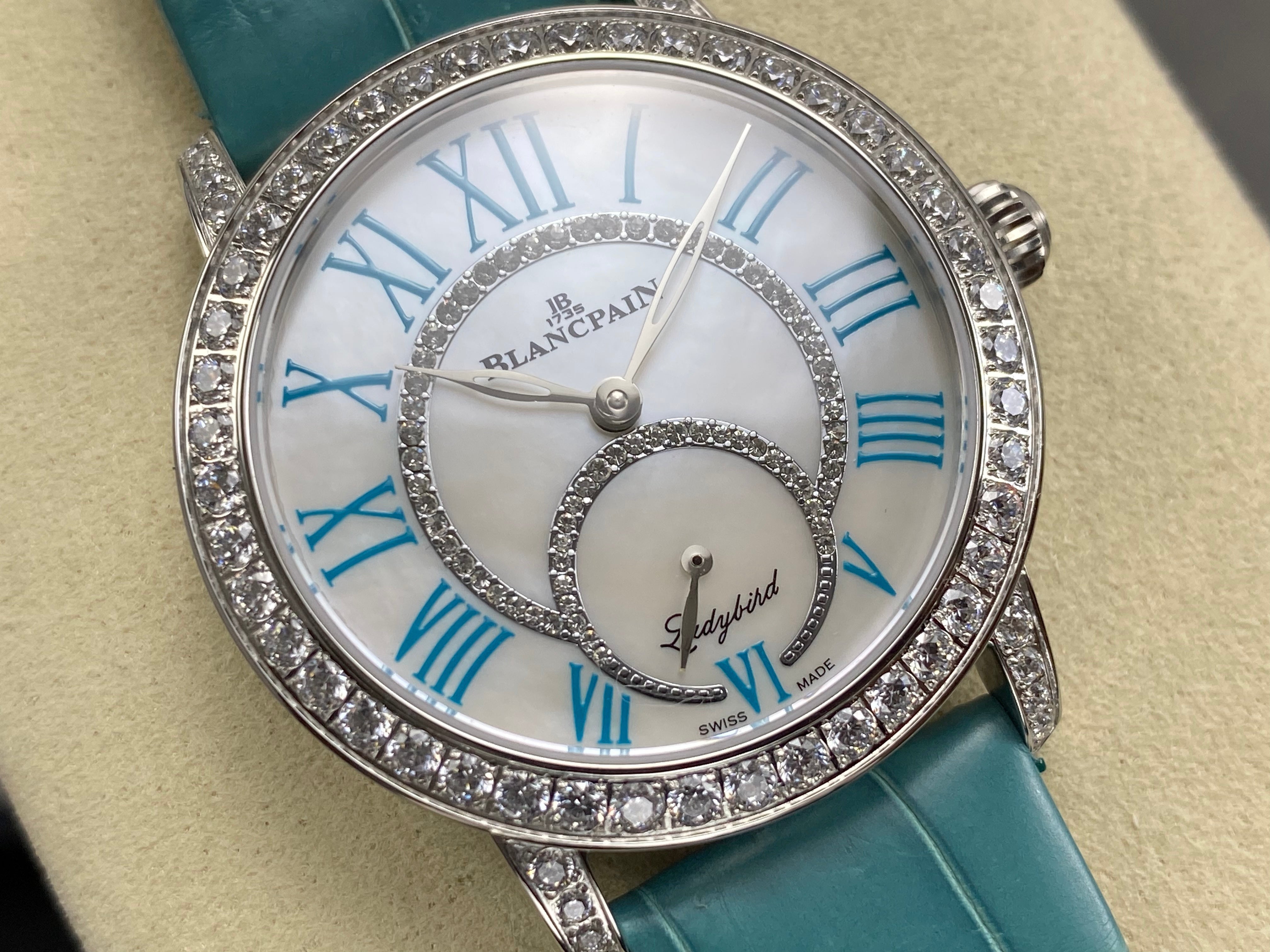 Blancpain's Ladybird 35mm White Blue Dial Diamond Bezel Leather