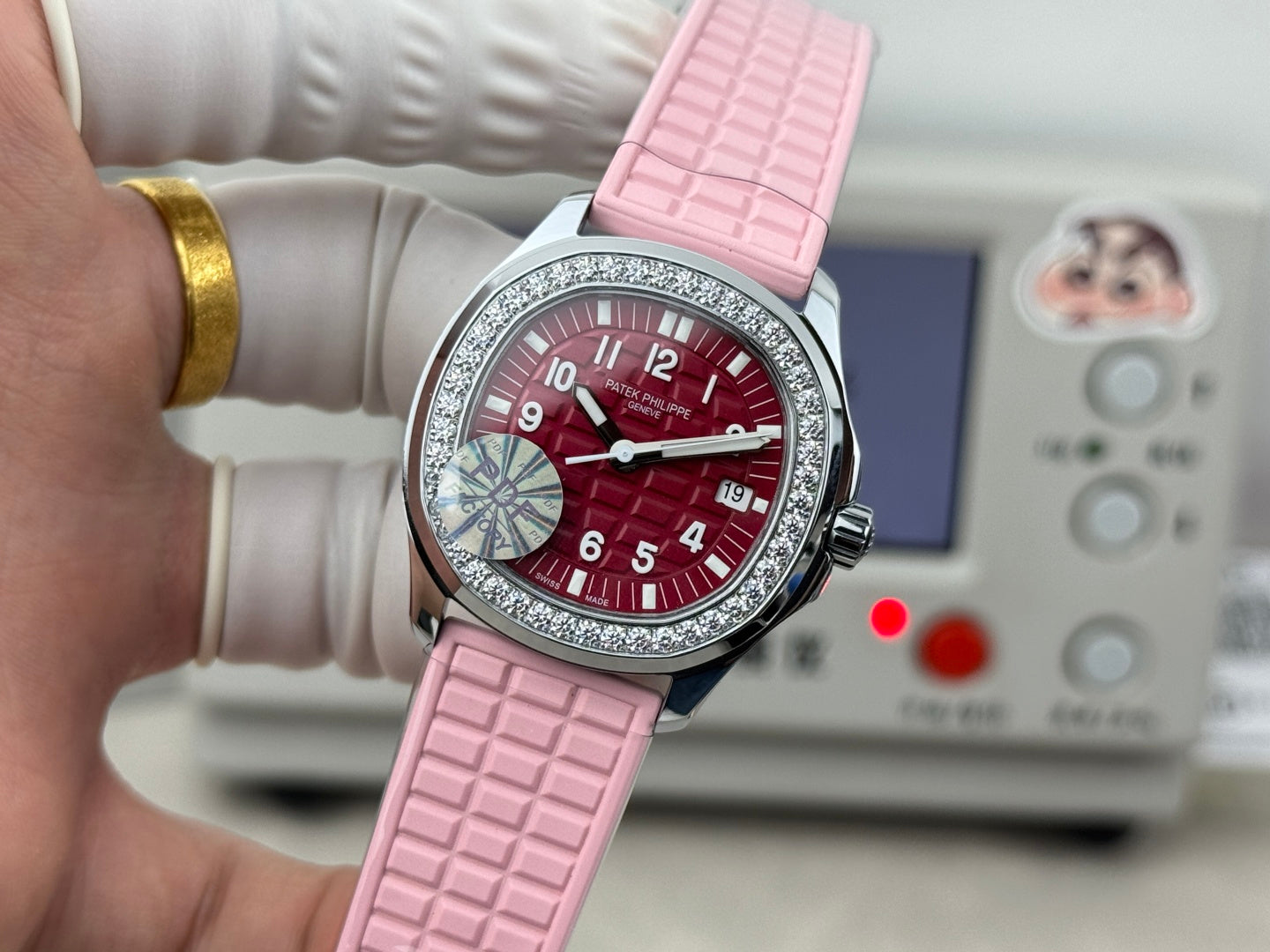 Patek Philippe Aquanaut 35.6mm Red Dial Pink Rubber Strap