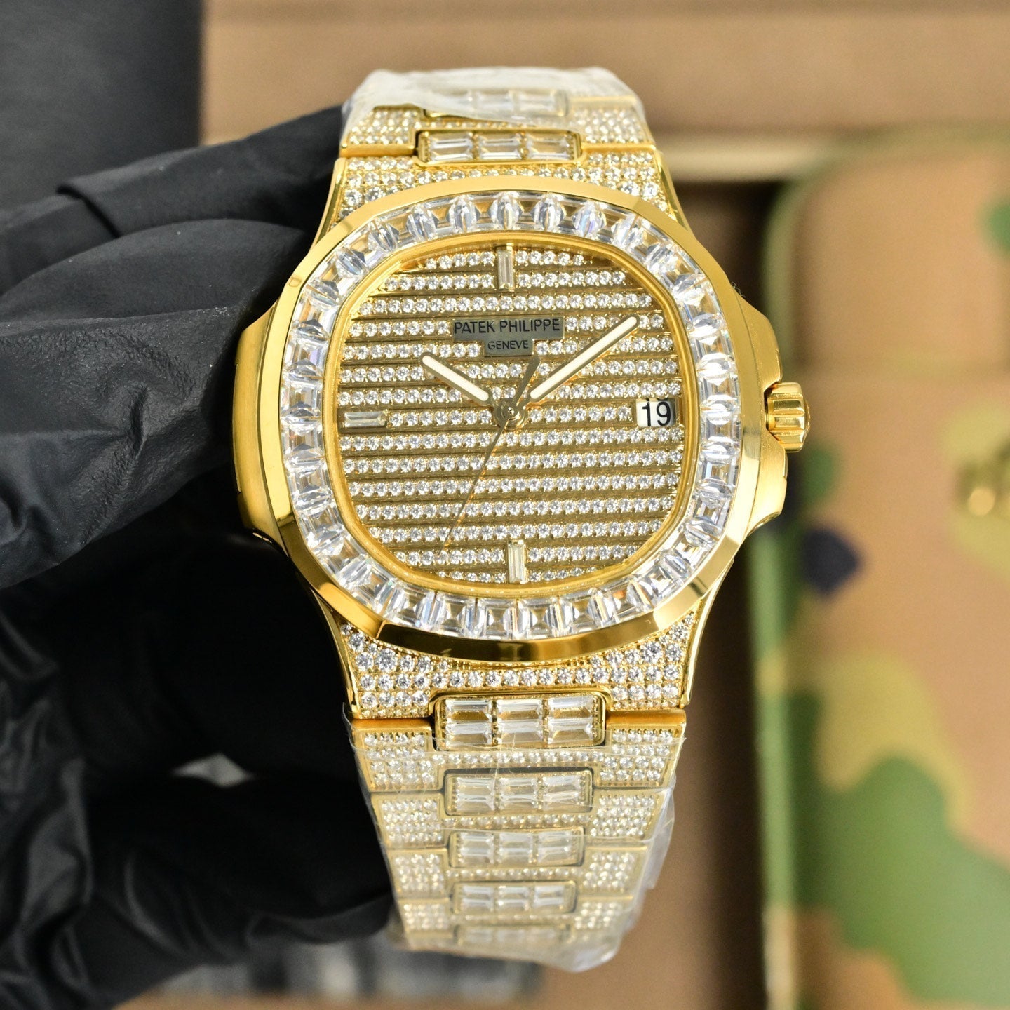 Patek Philippe Nautilus 40mm Yellow Gold Baguette Diamonds Watch