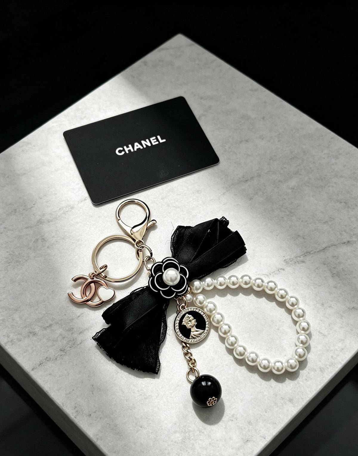 Chanel Black Bow Pearls Charm