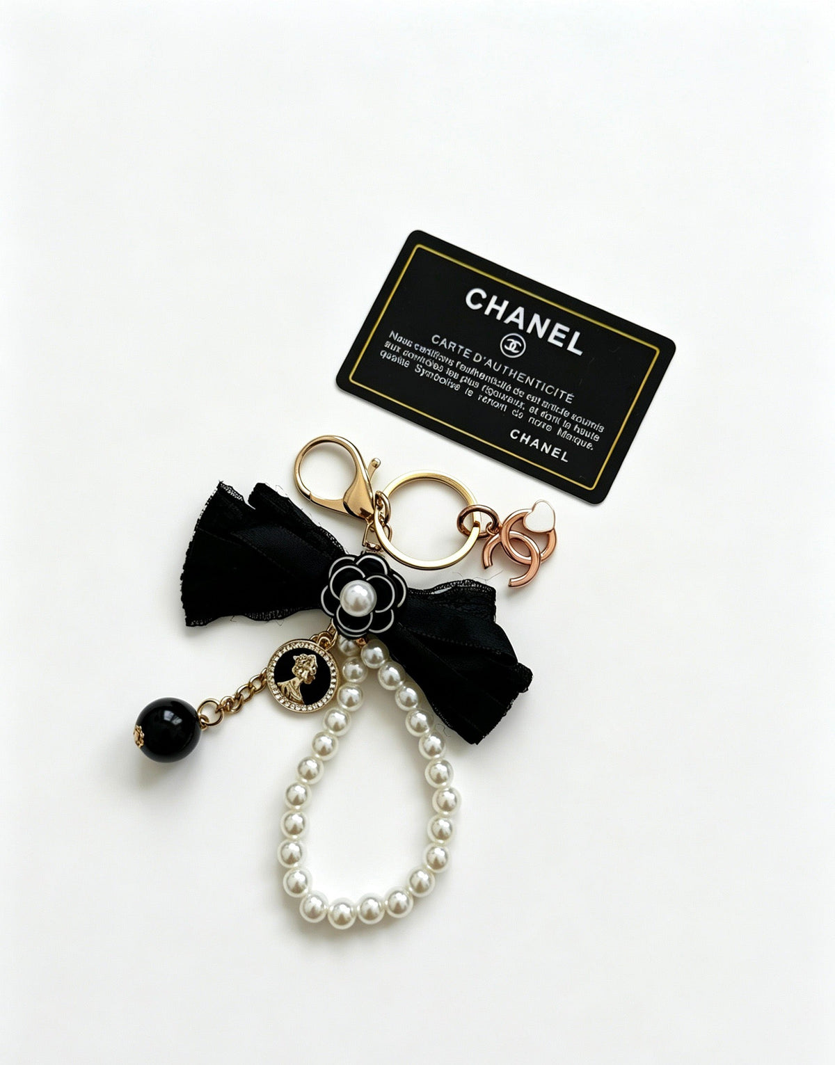 Chanel Black Bow Pearls Charm