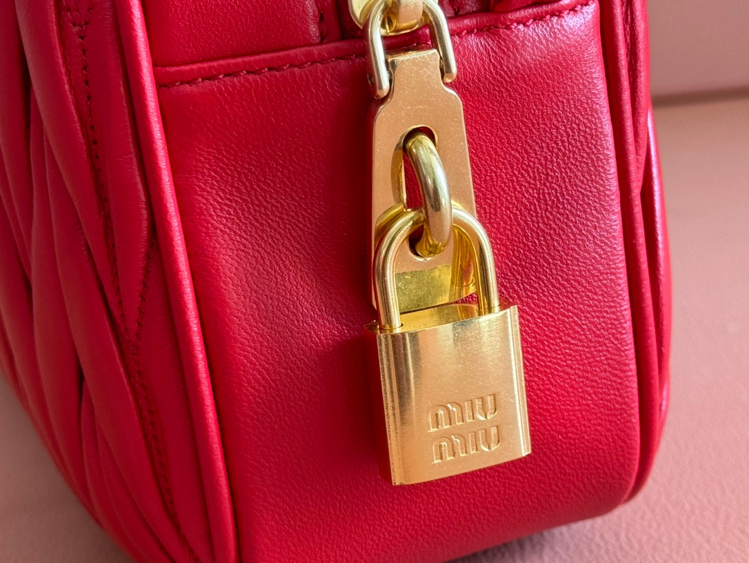 ARCADIE MATELASSÃ‰ BAG 24 IN CERISE RED CALFSKIN GOLD HARDWARE